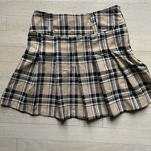 Tan/black/ white pleated plaid Tennis skirt.